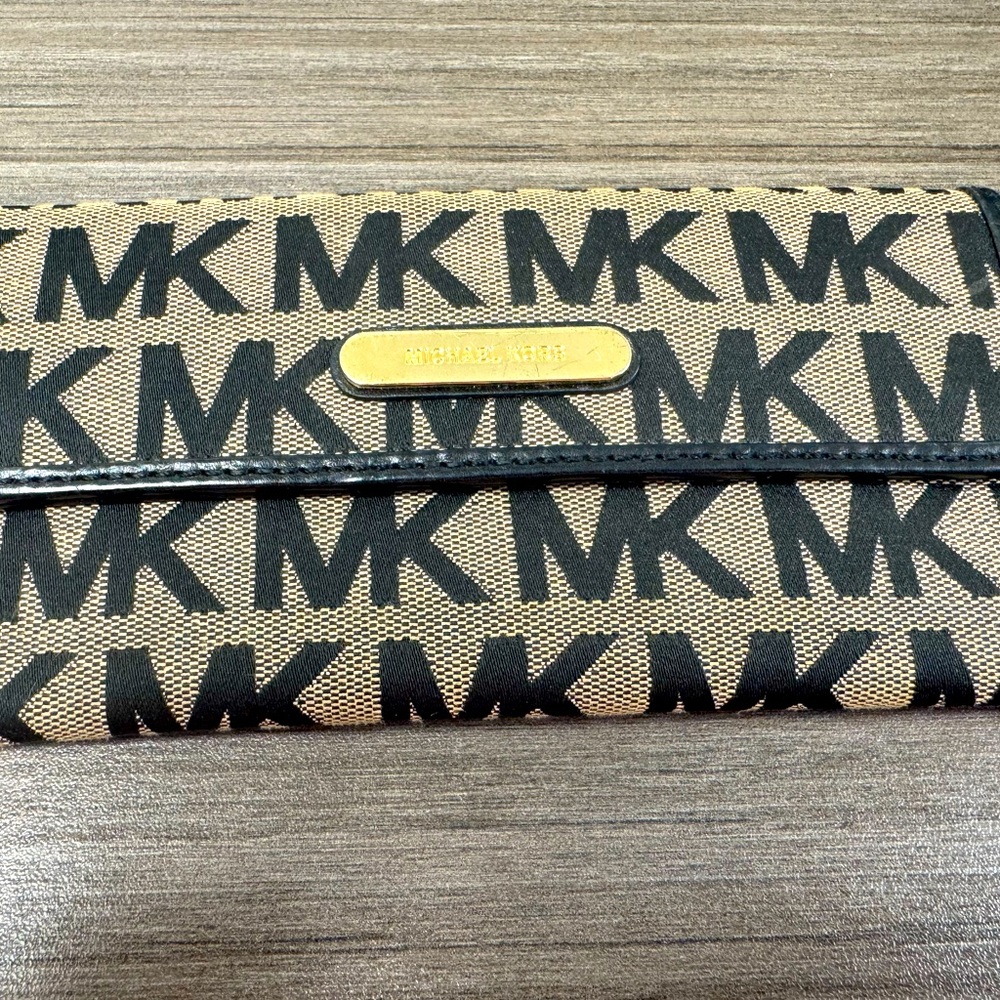Michael Kors flip pocket envelope wallet.  Pre owned